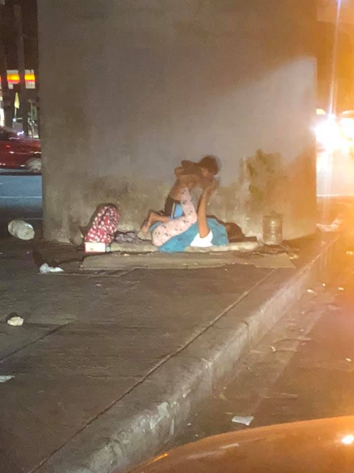 This Homeless Mother And Son Playing At The Roadside Are The Perfect Example Of Love And Happiness