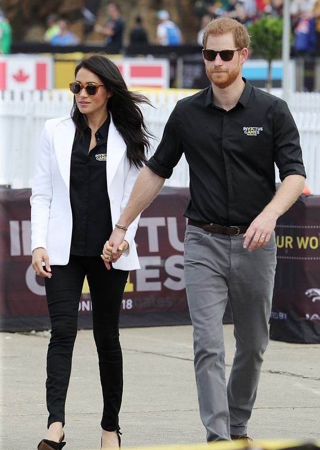 Here Is Why Prince Harry Walks Slightly Ahead Of Meghan Markle