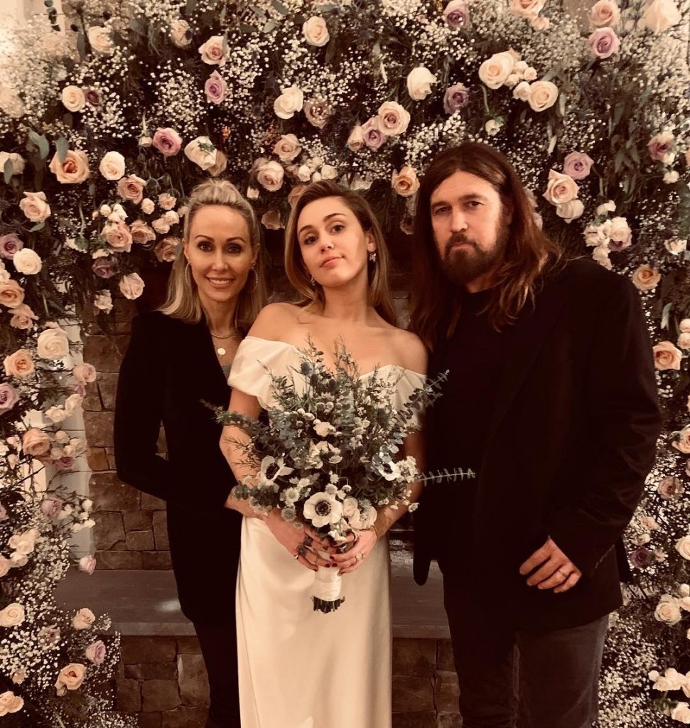 Miley Cyrus Looks Elegant In Her First Wedding Pictures As She Poses With Her Parents