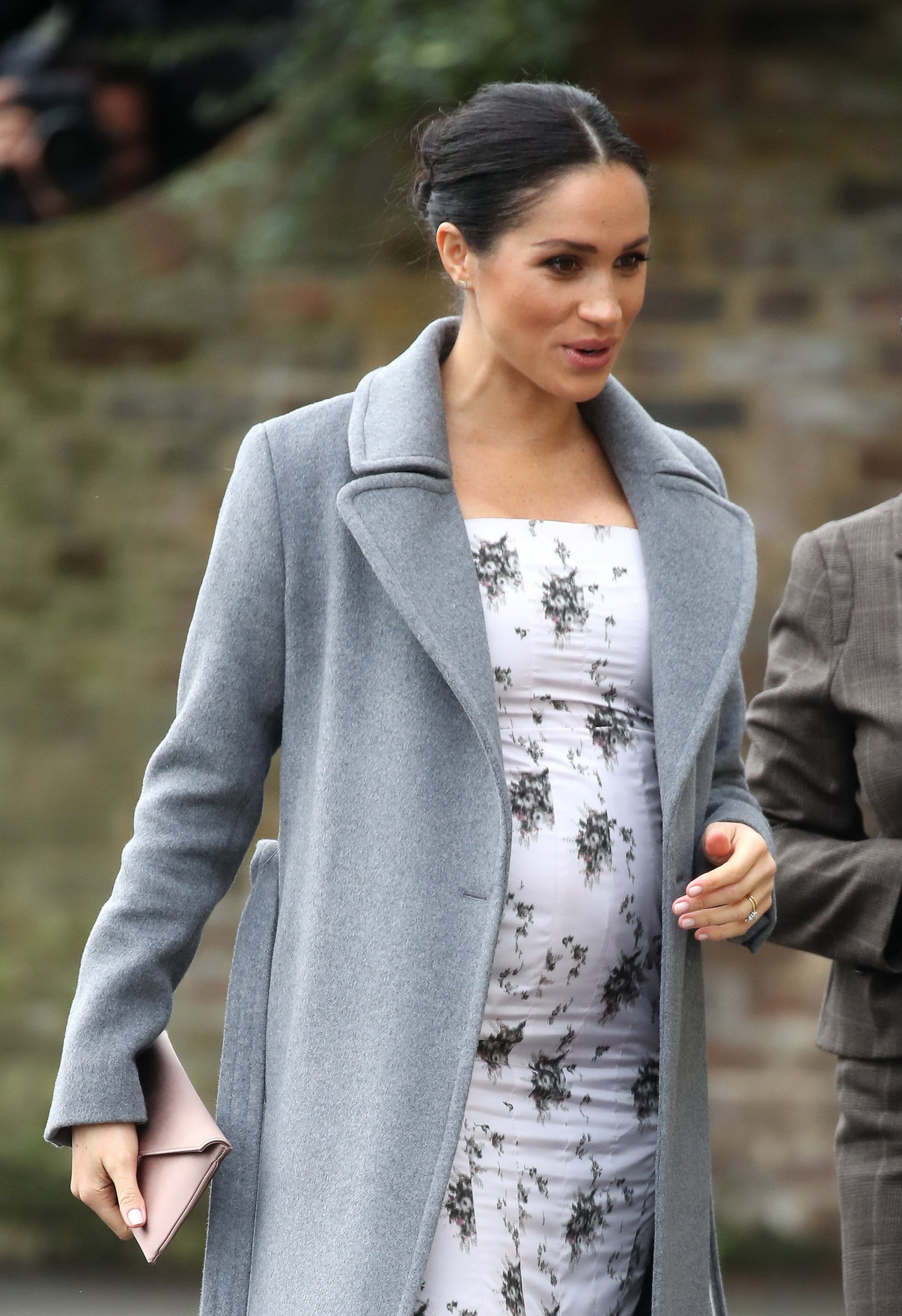 Meghan Markle Shows Off Baby Bump As She Visits Royal Variety Nursing Home