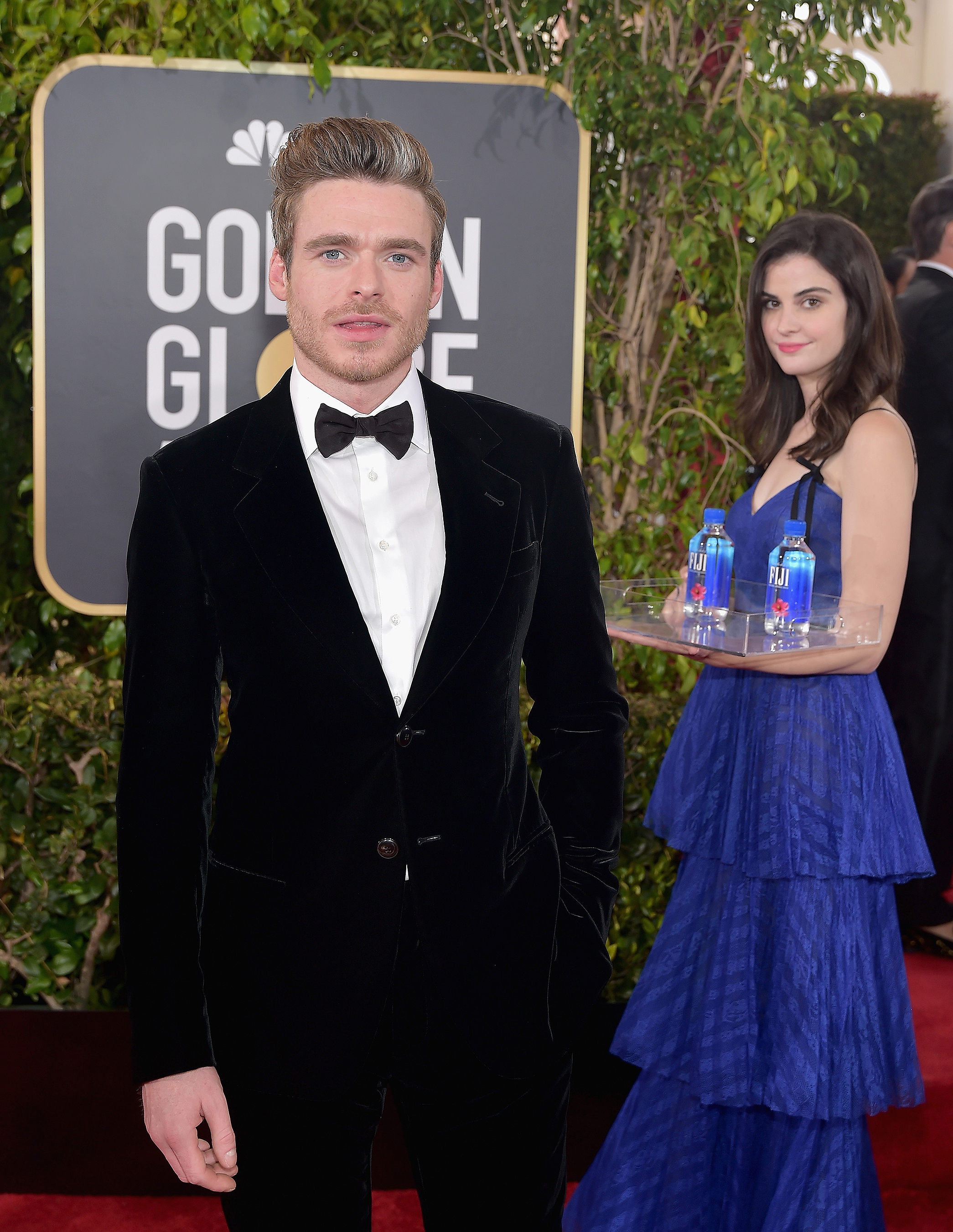 'Fiji Water Girl' Becomes Famous For Photo-bombing Countless Red Carpet Pictures At Golden Globes