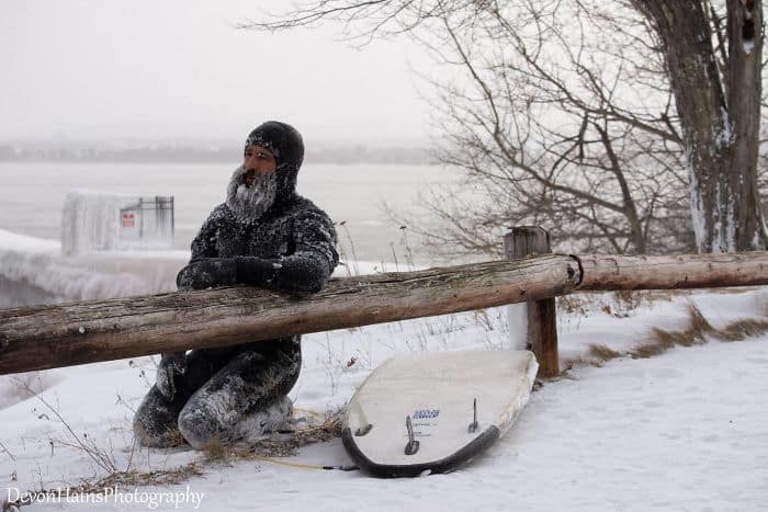 Two Surfers Catch Waves During Polar Vortex