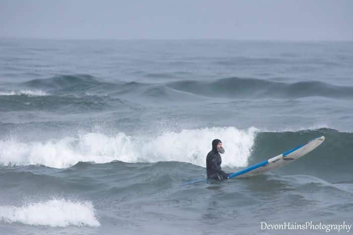 Two Surfers Catch Waves During Polar Vortex