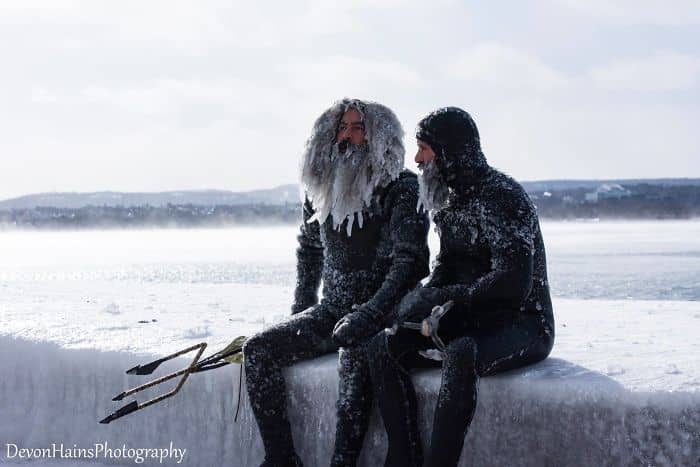 Two Surfers Catch Waves During Polar Vortex