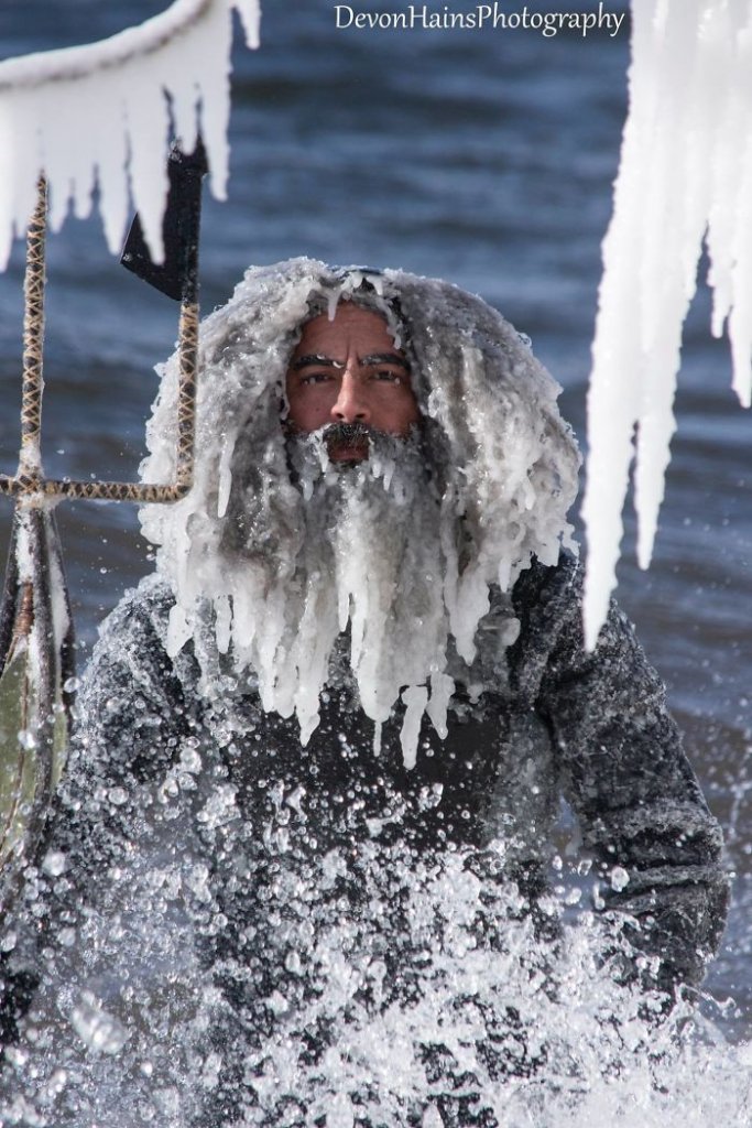 Two Surfers Catch Waves During Polar Vortex