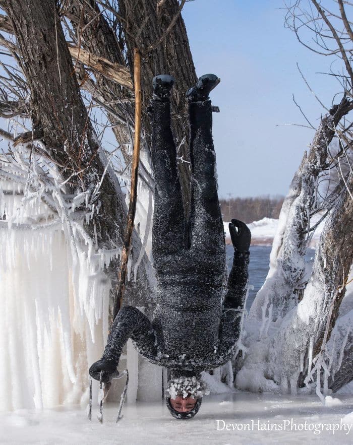 Two Surfers Catch Waves During Polar Vortex