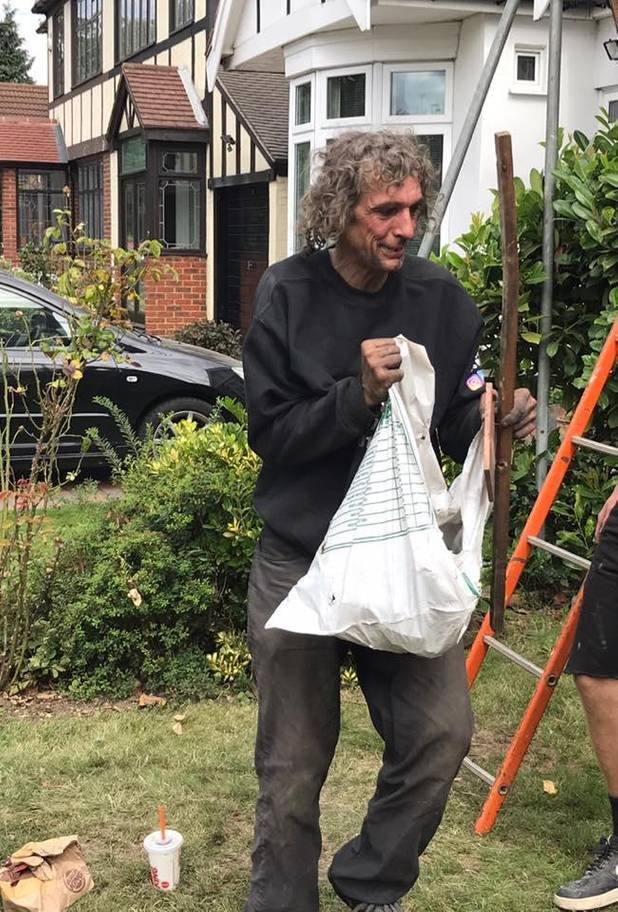 Roofers help homeless man with work
