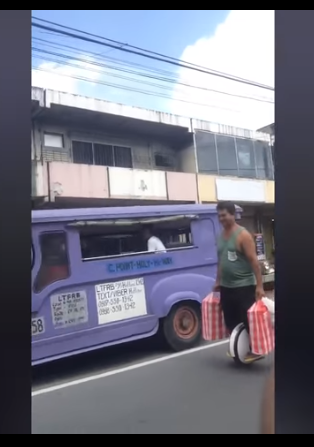 Filipino Waiter Delivers Food On A Hover Unicycle With Full Swag
