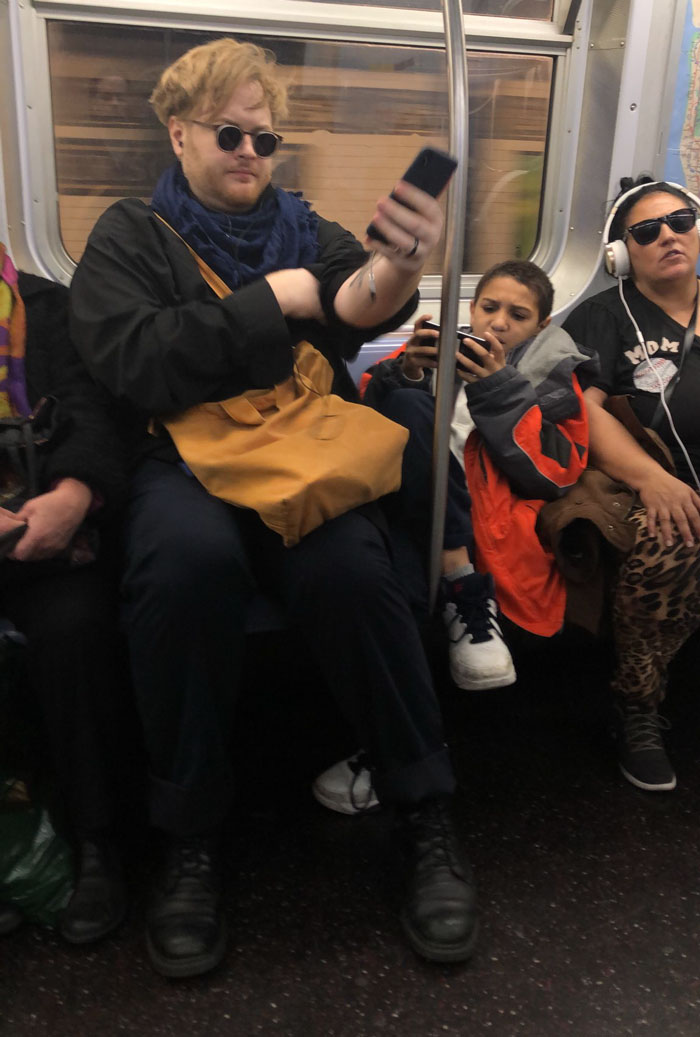 Kid and man on subway