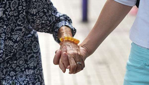 This Girl Carries Her Grandma To Work So That She Doesn't Feel Alone