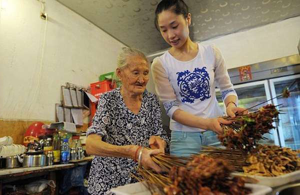 This Girl Carries Her Grandma To Work So That She Doesn't Feel Alone