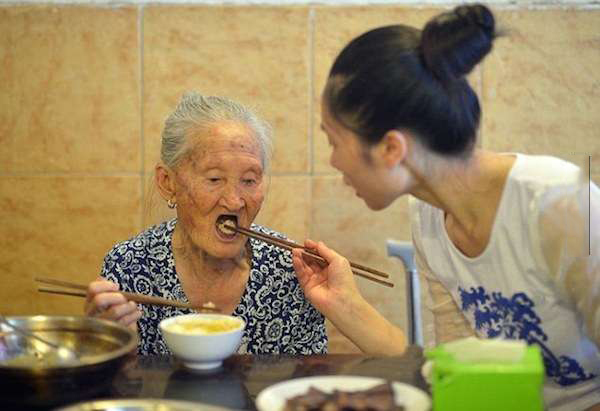 This Girl Carries Her Grandma To Work So That She Doesn't Feel Alone