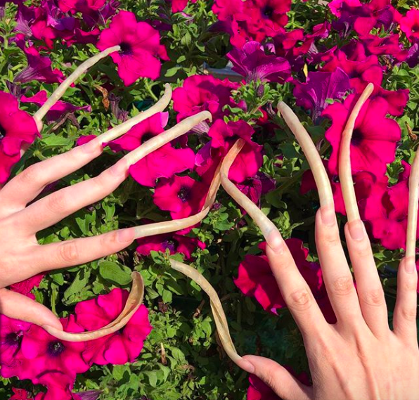 woman with long fingernails for four years wins bet with friend