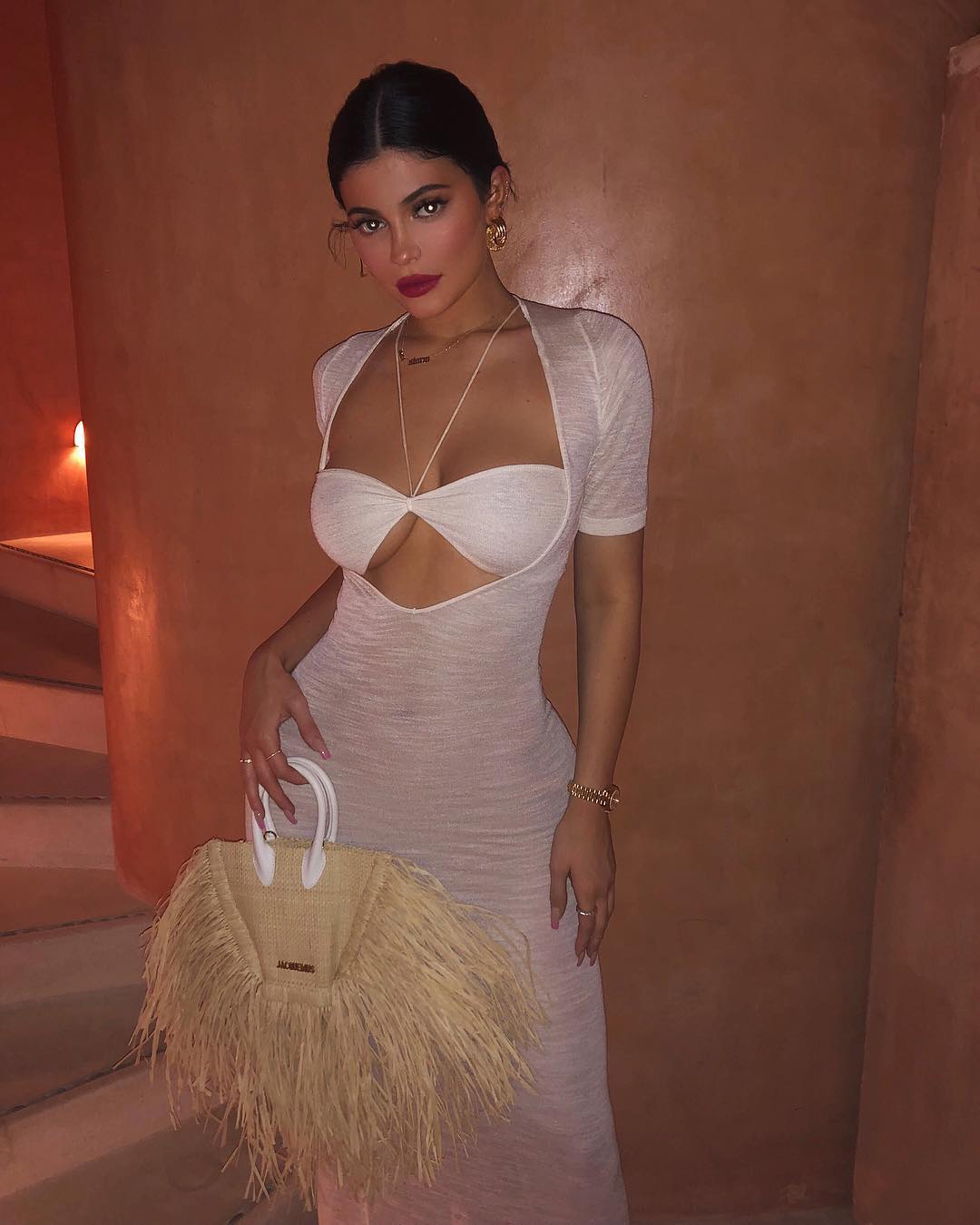 Kylie Jenner Posts Images From Her Vacation With Travis Scott Wearing A Sheer Dress