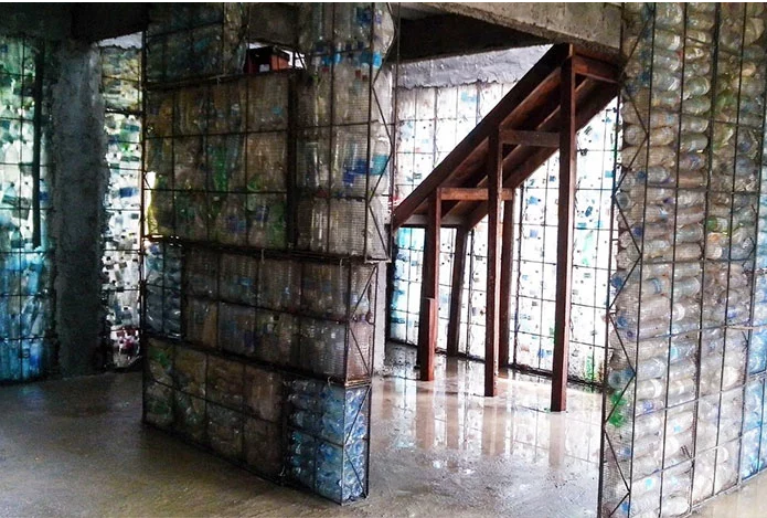 man creates Plastic Bottle Homes