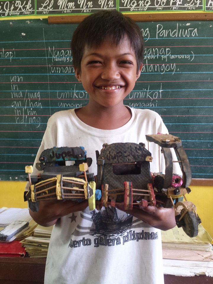 13 Year Old Poor Boy Transforms Discarded Rubber Slippers Into Model Cars