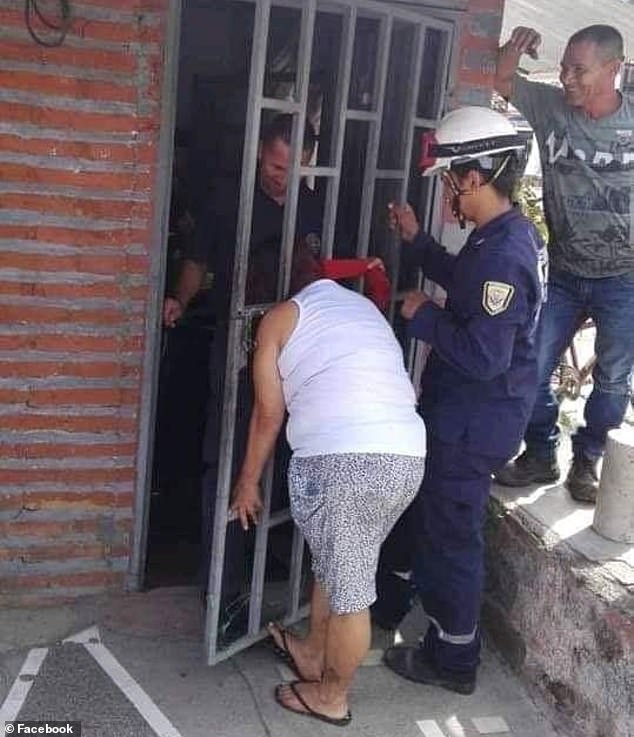 Woman Gets Her Head Stuck In Metal Gate For 5 Hours While Spying On The Next Door