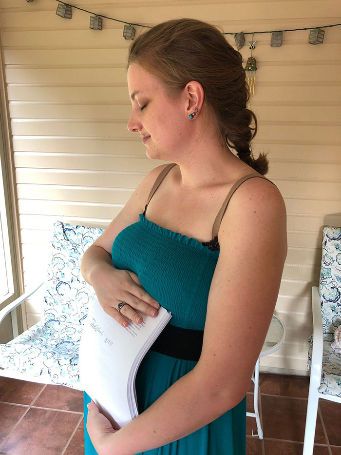 PhD Student Gets A Maternity Shoot With Her Thesis To Announce Her Graduation 