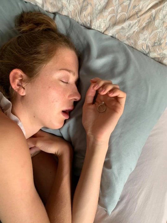 Girlfriend sleeping besides the ring