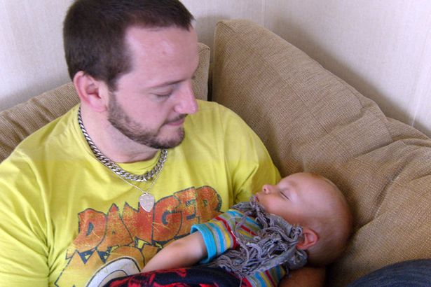 Warren with his baby boy back in 2010