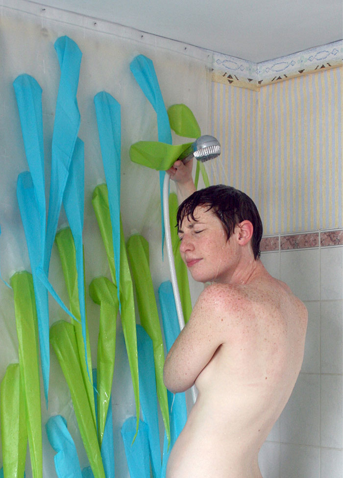 Shower Curtains With Spikes That Pops Out After Four Minutes Of Shower To Save Water