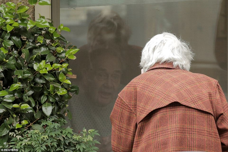 Heartbreaking Picture Shows Elderly Couple Separated by Coronavirus Lock-down 