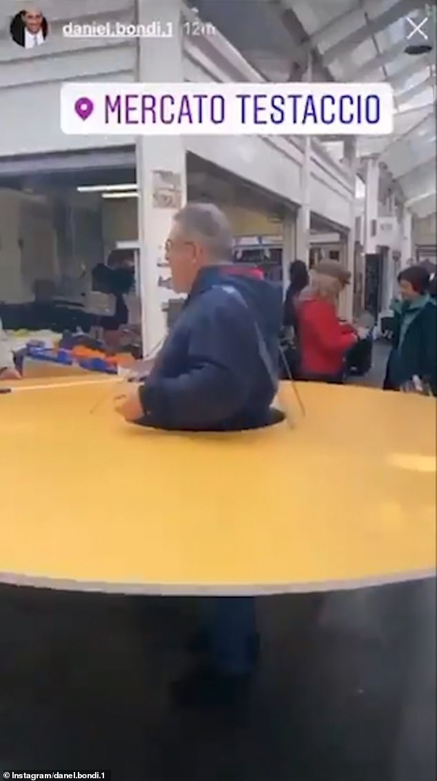 Italian Man Wears A Giant Social Isolation Disk As A Safety Measure For Coronavirus