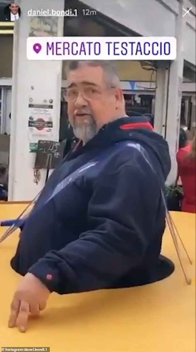 Italian Man Wears A Giant Social Isolation Disk As A Safety Measure For Coronavirus