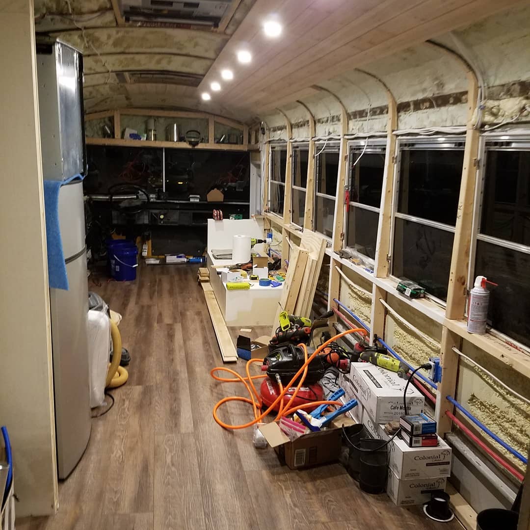 couple transformed old school bus into cute tiny house on wheels