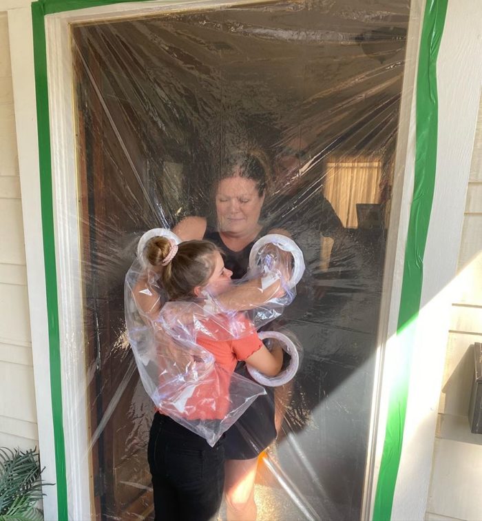 Little Girl Invents Hug Curtains Made of Plastic To Hug Her Grandparents Amid Pandemic