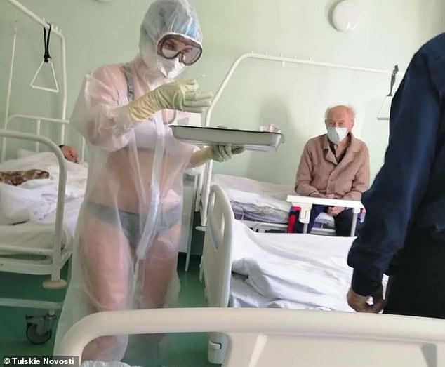 Russian Nurse Is Suspended After Wearing Bikini Under Transparent PPE Gown