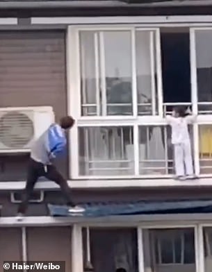 Chinese Man Scales Tall Building With Bare Hands To Save A Kid Hanging from Balcony