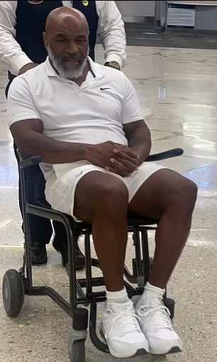 Mike Tyson Is Seen On a Wheelchair At Miami Airport 