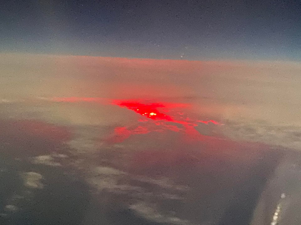 Fiery Red Glow In Clouds